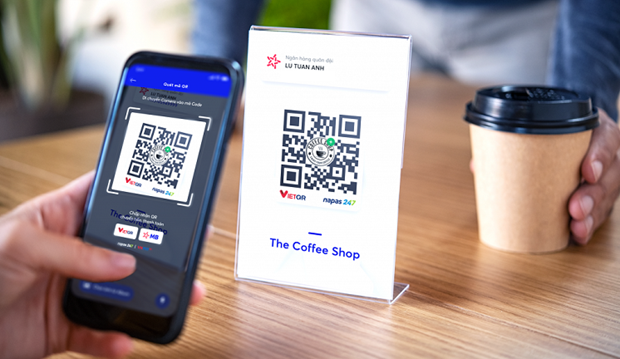 Mobile phone, QR code payments soar in popularity hinh anh 1