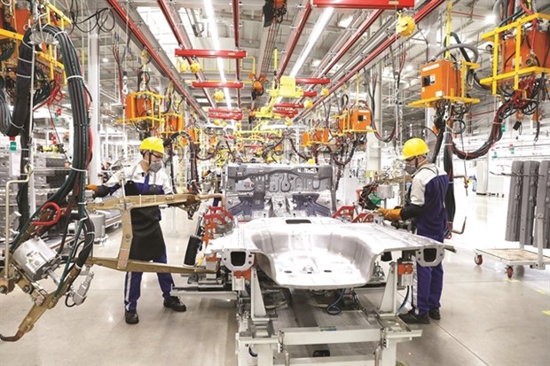 Vietnam’s auto industry needs deeper involvement in global supply: experts hinh anh 1