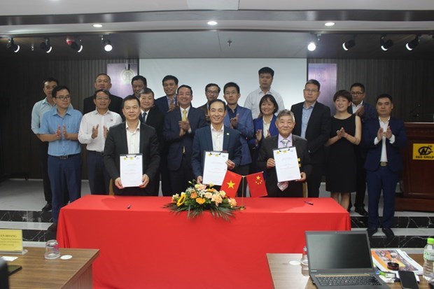 Hanoi, Shanghai businesses set up cooperation hinh anh 1