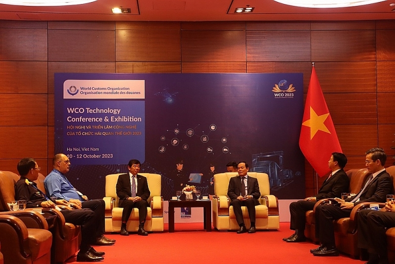  Deputy Prime Minister Tran Luu Quang had a courtesy meeting with WCO Secretary General Dr. Kunio Mikuriya. Photo: Quang Hung.
