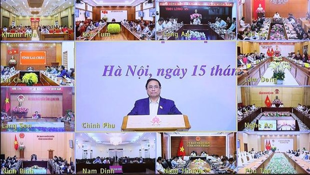 PM chairs national teleconference on tourism development hinh anh 1