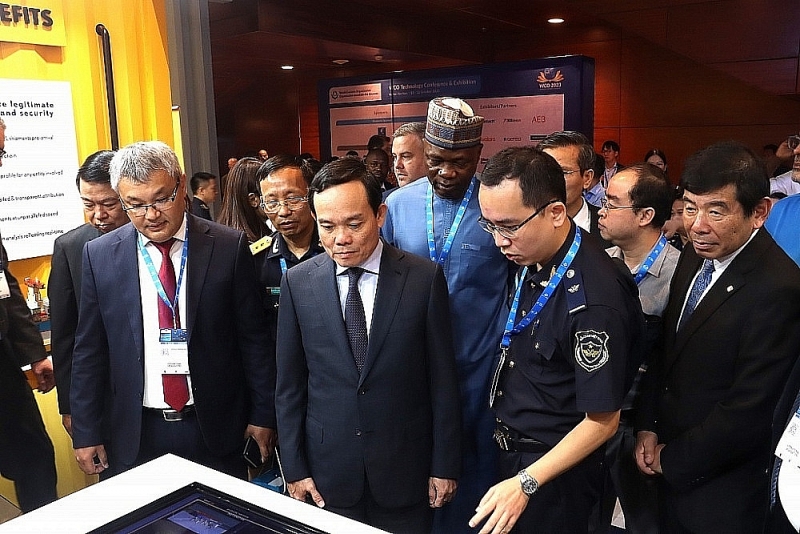 Deputy Prime Minister Tran Luu Quang and senior leaders of the WCO and Customs administrations of countries visit booths at the 2023 WCO Technology Conference and Exhibition. Photo: Quang Hung