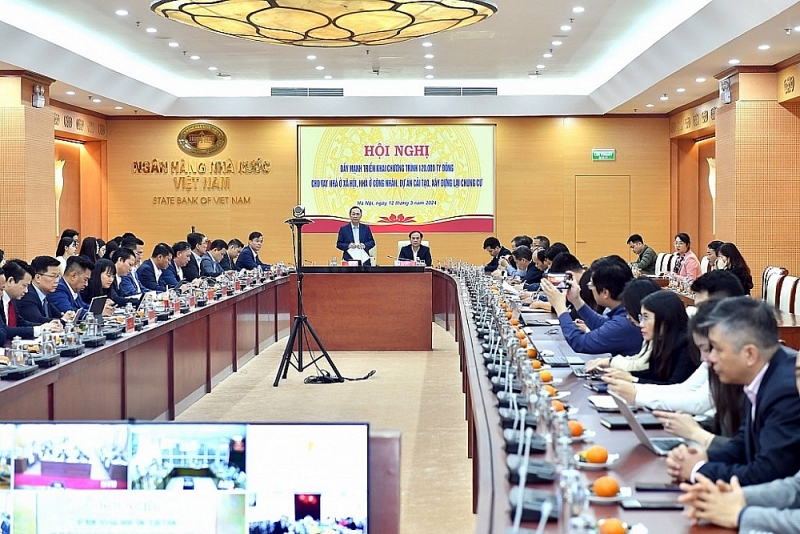 Deputy Governor of the SBV Dao Minh Tu and Deputy Minister of Construction Nguyen Van Sinh chaired the conference