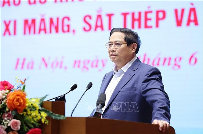 Prime Minister Pham Minh Chinh speaking at the conference (Photo: VNA)