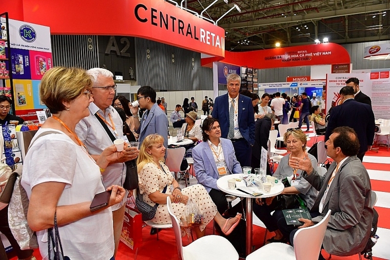 International visitors visit the booth promoting Vietnamese coffee. Photo: CTV