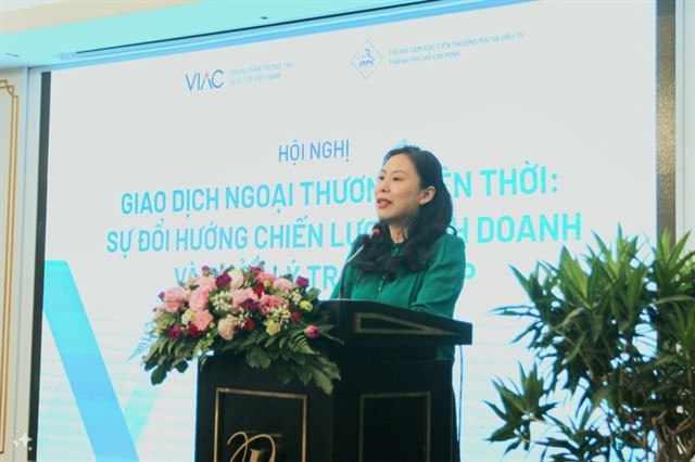 Ho Thi Quyen, deputy director of the Investment and Trade Promotion Centre of HCM City, speaks at the conference titled “Current Foreign Trade Transactions: Changes in Business Strategies and Disputes Management” in HCM City on July 5. (Photo: Courtesy of ITPC)