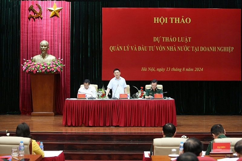 Minister of Finance Ho Duc Phoc made a speech at the workshop. Photo: Đức Minh