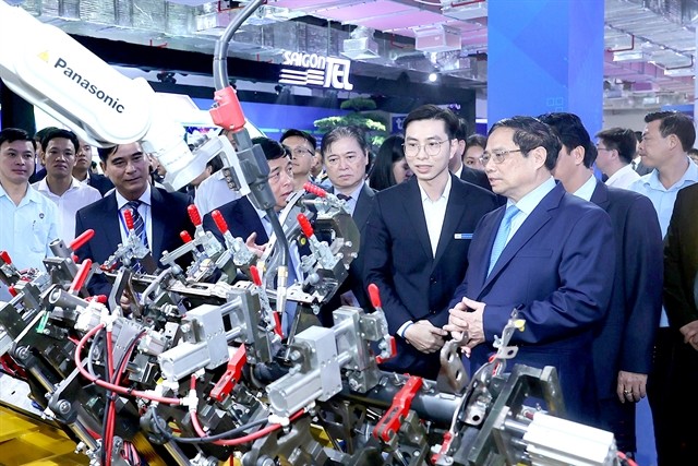 Prime Minister Pham Minh Chinh visits the Vietnam International Innovation Expo 2023 (VIIE 2023) in Hanoi last October. (Photo: VNA)