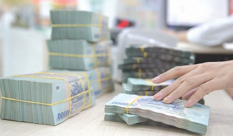 Credit growth across the industry is expected to recover in the final months of the year. Photo: ST