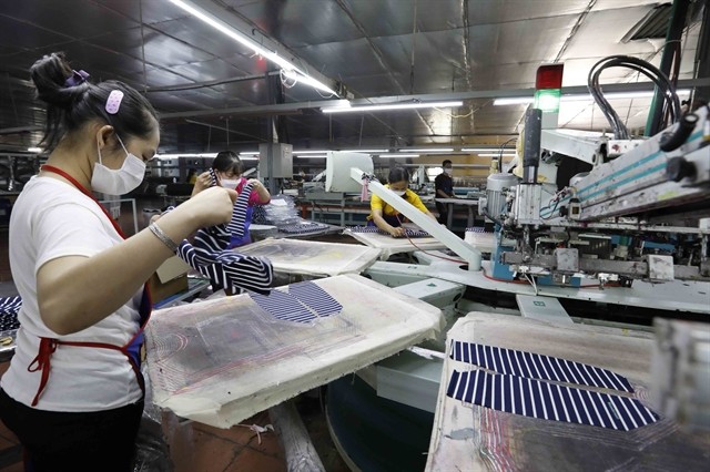 Garments are made by workers of An Phu Printing &amp; Garment Export Co in Hung Yen province. (Photo: VNA)