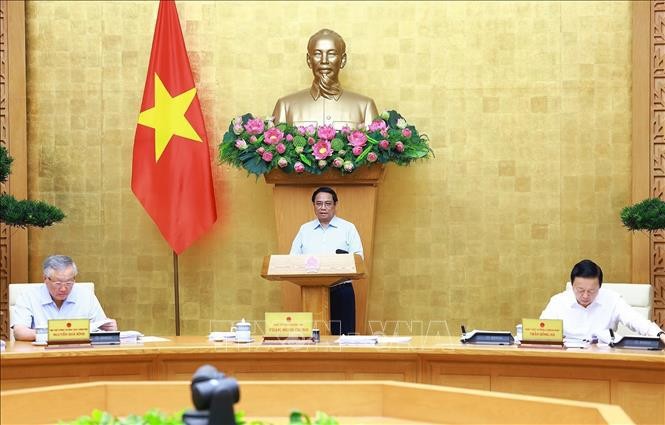 Prime Minister Pham Minh Chinh chairs Government's monthly law-making session (Photo: VNA)