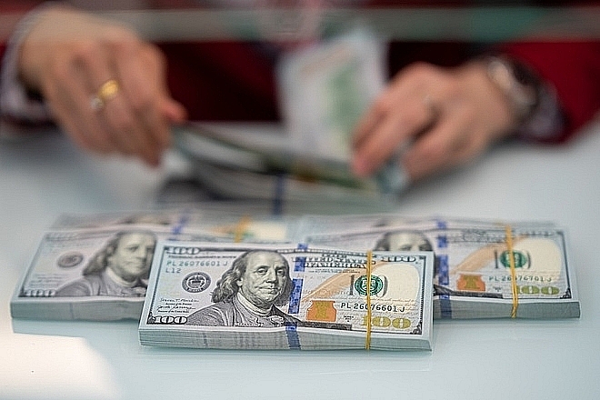 Exchange rate pressure will decrease after the Fed's decision to lower interest rates. Photo: Internet