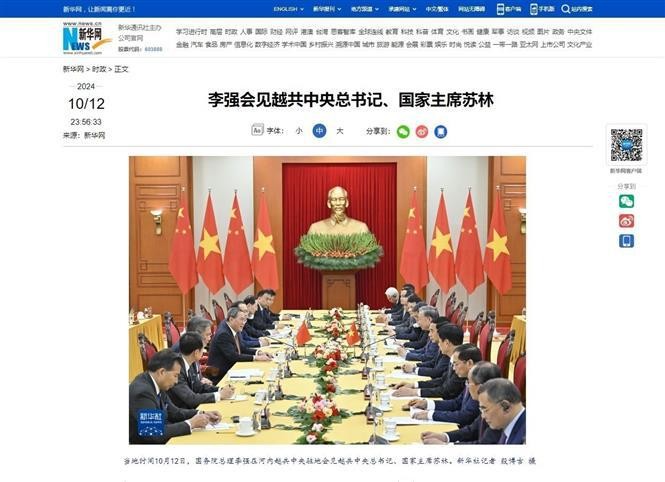 Xinhua reports on the meeting between Vietnamese Party General Secretary and President To Lam and Chinese Premier Li Qiang. (Photo: VNA)