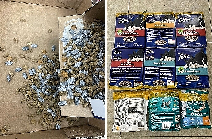 Drugs hidden in dog and cat food. Photo: Hanoi City Police