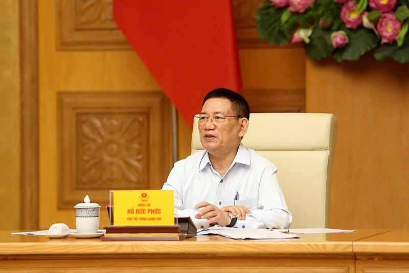 Deputy Prime Minister and Minister of Finance Ho Duc Phoc chaired the meeting. Photo: Khanh Huyen