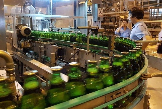 Workers at a SABECO factory in Ho Chi Minh City in southern Vietnam. (Photo: VNA)