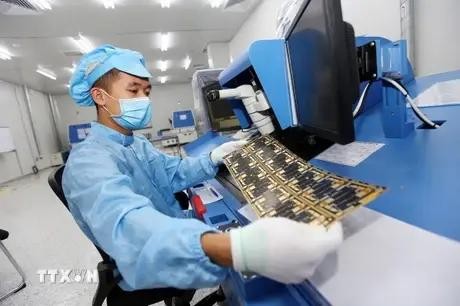 Production of electronic components (Photo: VNA)