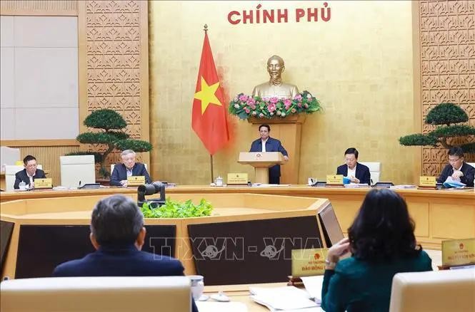 Prime Minister Pham Minh Chinh addresses the Government’s monthly regular meeting on December 7. (Photo: VNA)