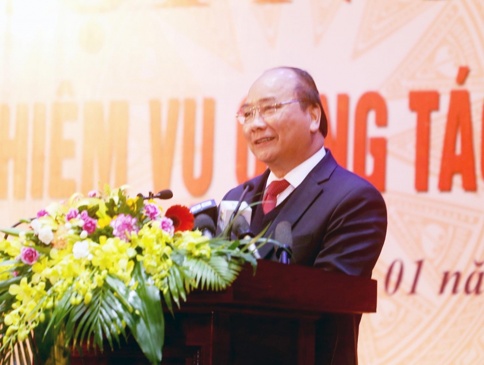 prime minister nguyen xuan phuc promoting the implementation of plan on tax modernization