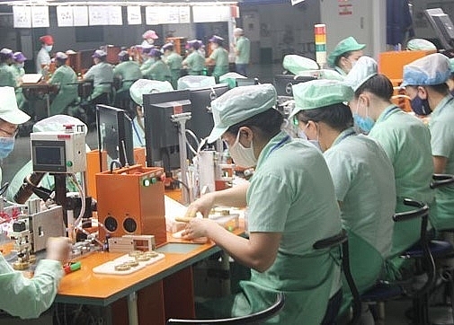 The entire processing-manufacturing industry was greatly affected by the long Tet holiday in January 2023. (Photo courtesy: VNA)