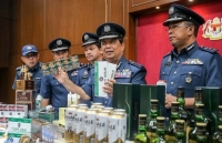 Perak Customs seize contraband cigarettes and alcohol worth over RM2m in two separate raids