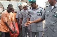 Customs seizes 1,393 bags of rice hidden in gas cylinders