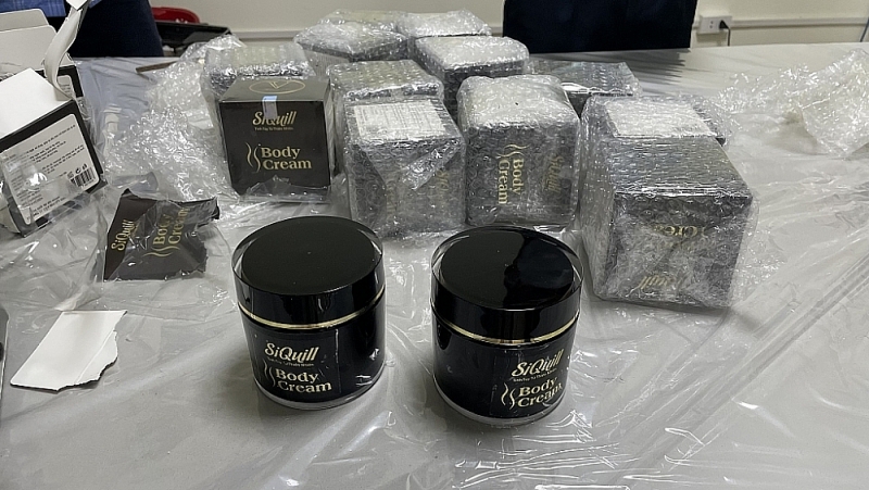 White crystals suspected of being methamphetamine are hidden in cosmetic boxes