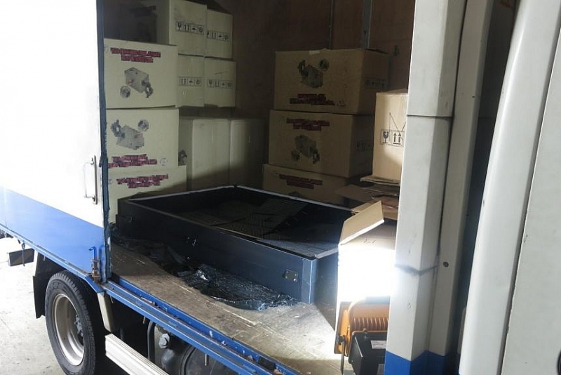 1,120 cartons of duty-unpaid cigarettes were found in the truck at the loading/unloading bay of an industrial building in Woodlands Industrial Park.PHOTO: SINGAPORE CUSTOMS