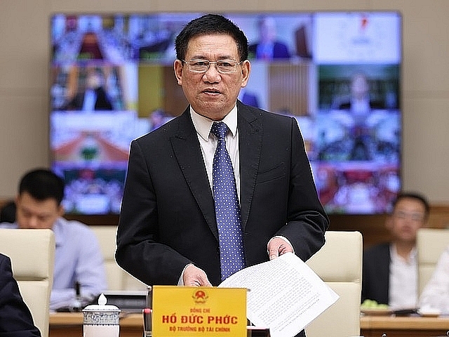 Minister of Finance Ho Duc Phoc spoke at the conference. Photo: VGP