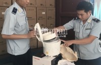 Binh Duong Customs detects a shipment of electric rice cookers in violation of origin