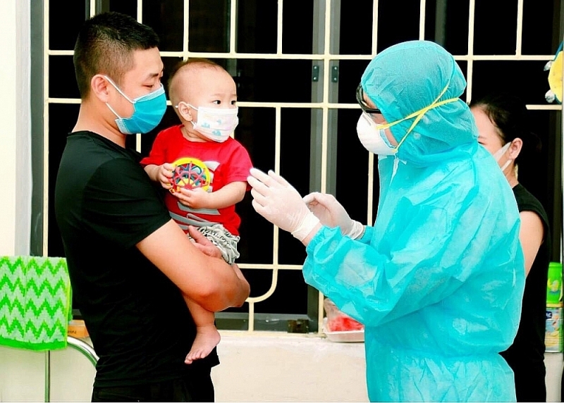 The State budget in 2022 will devote resources to the prevention and control of the Covid-19 pandemic. Photo: Tra Huong