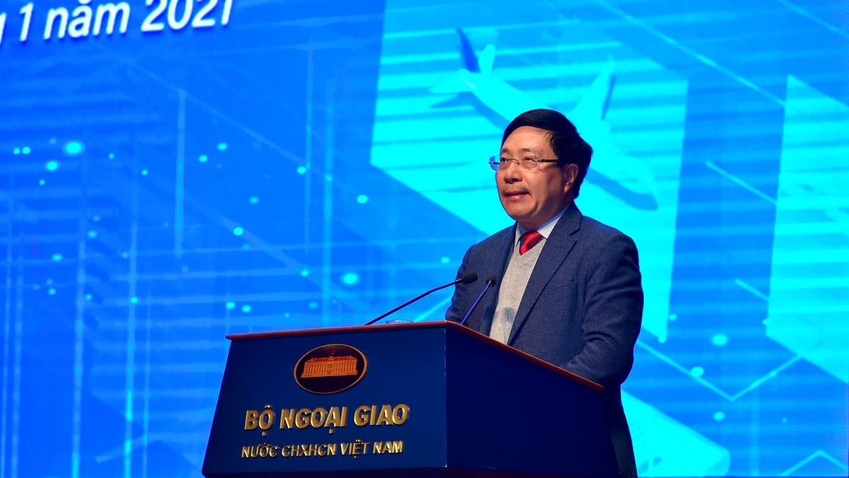 Deputy Prime Minister and Foreign Minister Pham Binh Minh addresses the conference to review Vietnam's diplomatic work in 2020 and outline tasks for 2021. 