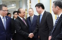 PM Phuc pledges best possible conditions for leading Chinese businesses