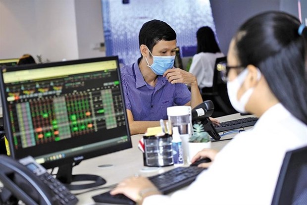 Securities companies set mixed earning targets this year hinh anh 1