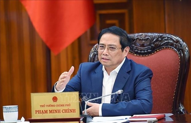 PM works with ministries, agencies on finance-banking activities hinh anh 1