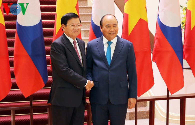 welcoming ceremony for lao prime minister in hanoi