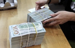 Reference exchange rate up 2 VND on October 14