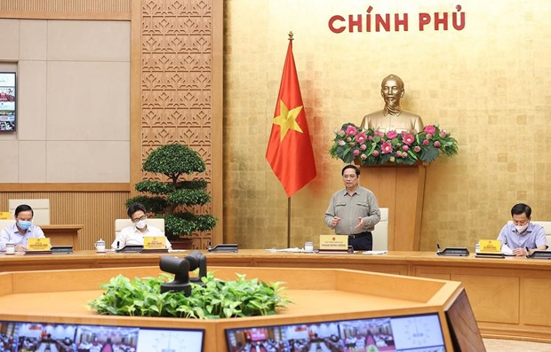 PM asks for safely adapting to pandemic hinh anh 1