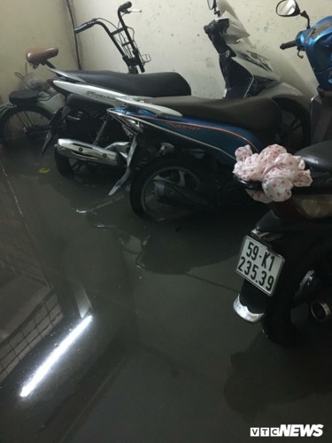 hcm citys streets inundated by downpours