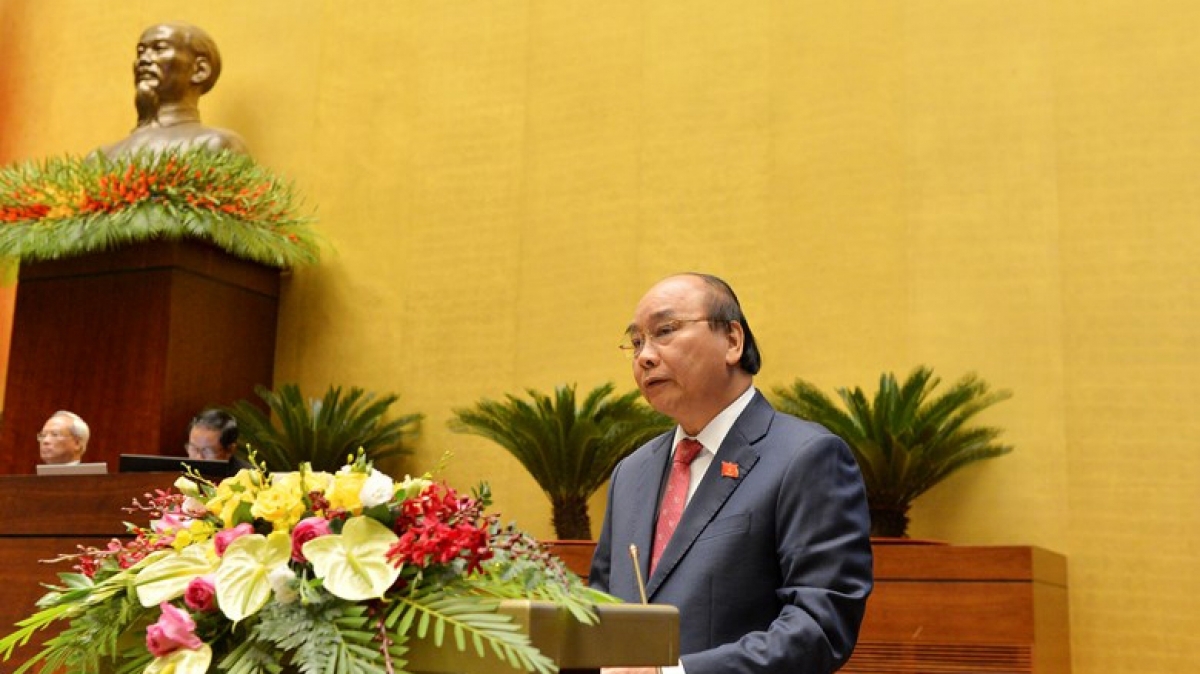 Prime Minister Nguyen Xuan Phuc stresses the need to redouble efforts as a means of avoid economic lag while addressing the plenary session of the 10th National Assembly (NA) sitting on November 10.