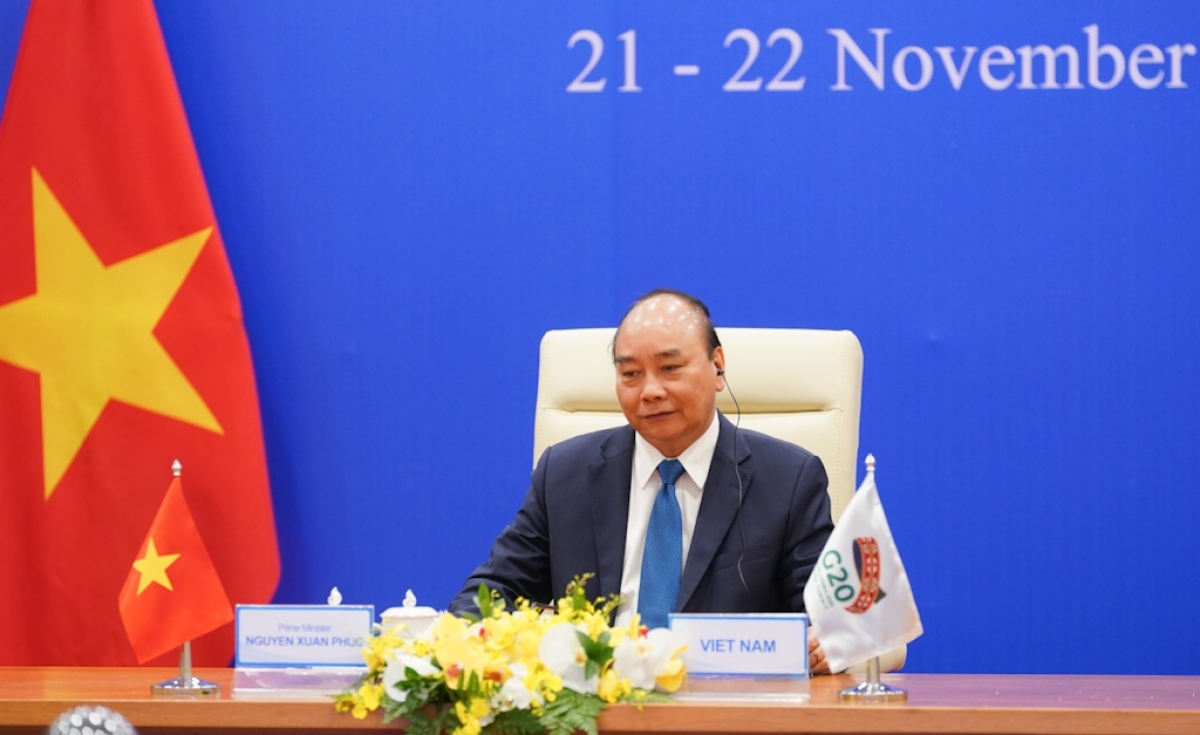 Attending the G20 Summit virtually held in Saudi Arabia, Vietnamese Prime Minister Nguyen Xuan Phuc calls for joint actions to repel the COVID-19 pandemic. (Photo: VGP).