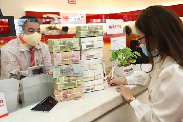 Banks allowed to extend credit growth quota hinh anh 1