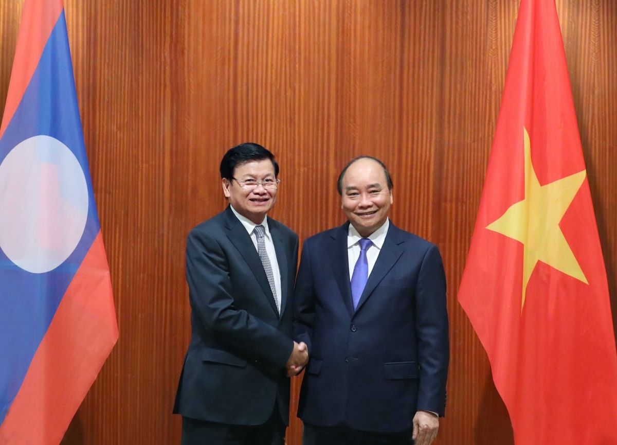 Lao Prime Minister Thongloun Sisoulith and his high-level government delegation pay a visit to Vietnam at the invitation of Prime Minister Nguyen Xuan Phuc from July 5-6, 2020. This is the first visit to the country by a foreign senior leader since the outbreak of the COVID-19 pandemic. (Photo: VNA)