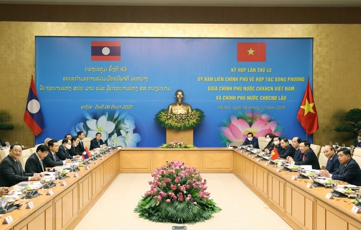 From December 4-6, PM Thongloun Sisoulith co-chair the 43rd session of the Intergovernmental Committee on Bilateral Cooperation between Vietnam and Laos, during which 17 cooperation agreements have been signed. (Photo: VNA)