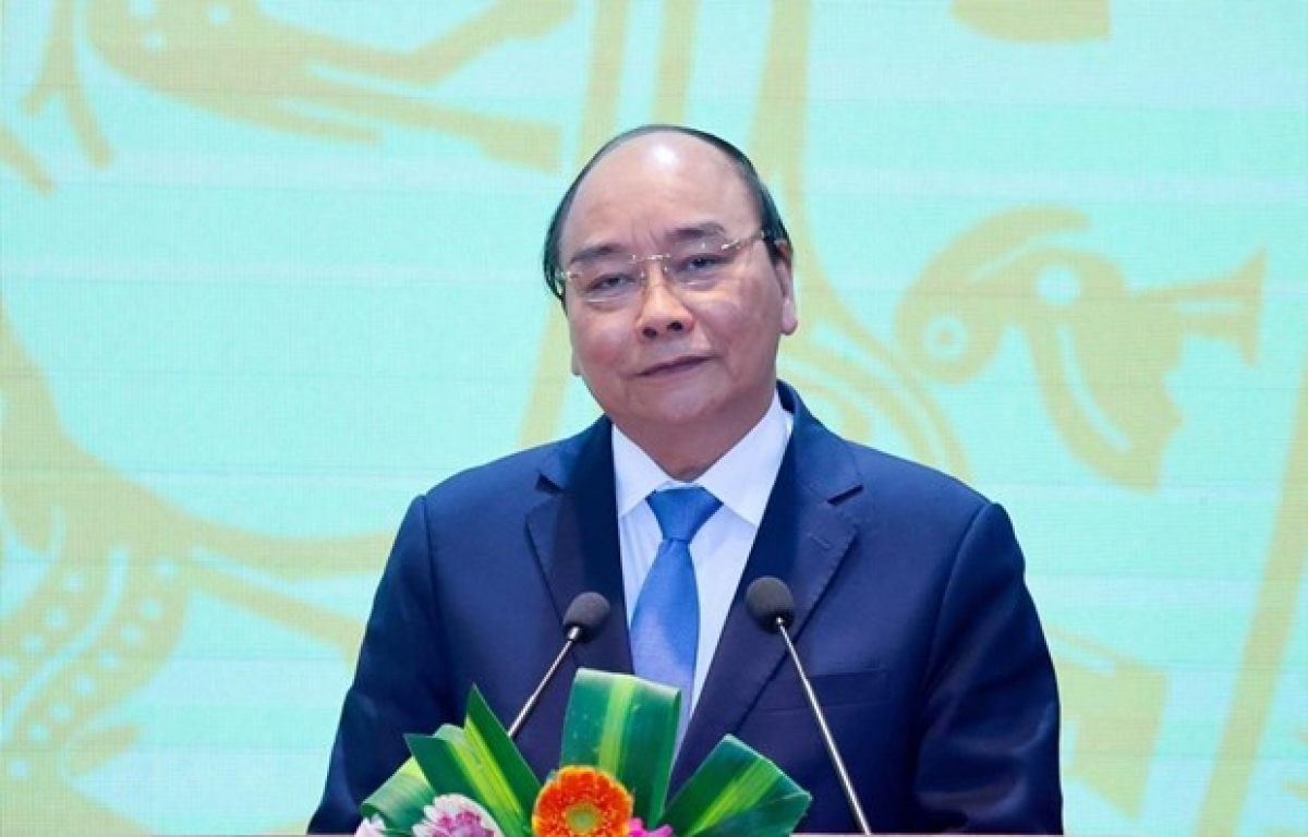 PM Nguyen Xuan Phuc speaks at the conference (Photo: VNA)