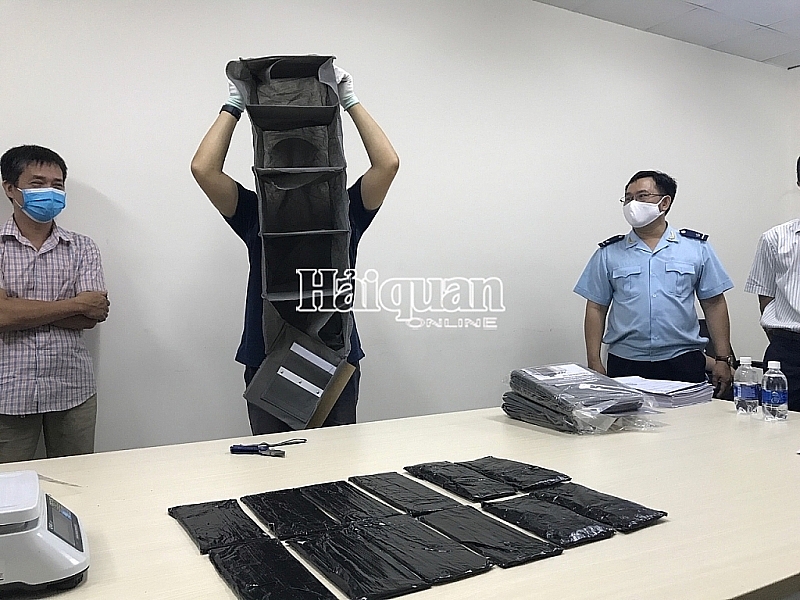 hcm city customs seizes more than 18kg of ecstasy hidden inside postal package
