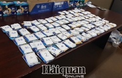 Car transporting drugs with logo of Vietnam Television