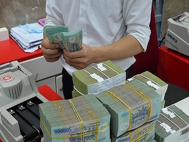 Many banks maintained their bad debt ratio below 1% in the first quarter of 2022. Photo: Internet