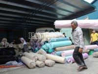 Discover large amount of material of textile fabric “under the cloak” of scrap