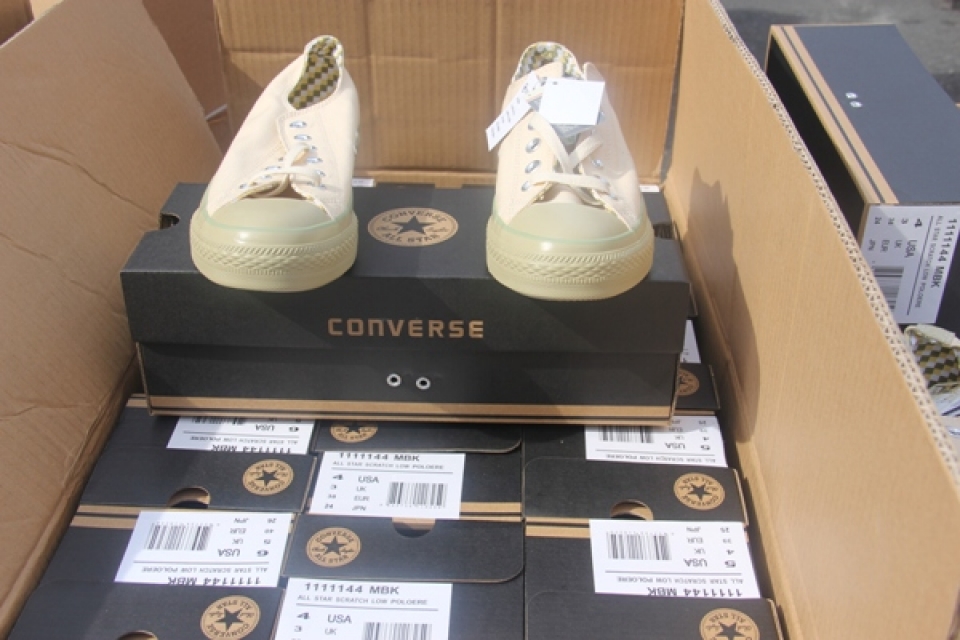 close up the shipment of converse shoes made in usa originating from china